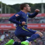 Antoine Griezmann celebrando un gol con el Atlético de Madrid tras salir desde el banquillo.