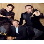 Miguel Ángel Silvestre, Marcos Llorente, Álex González y Antoine Griezmann posando en el restaurante Rhudo de Madrid.