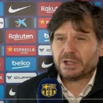 Mateu Alemany, directivo del Atlético de Madrid, habla en zona mixta ante un fondo de patrocinadores