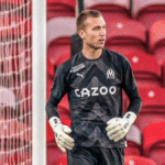 Rubén Blanco en un partido con el Olympique mientras su nombre suena para reemplazar a Ter Stegen en Girona