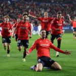 Jugadores de Osasuna durante un partido de LaLiga en El Sadar de Pamplona en la temporada actual